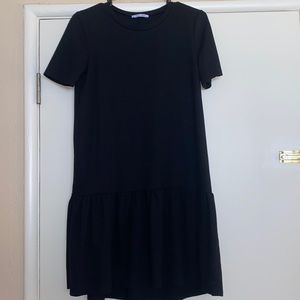 Black dress with ruffle bottom